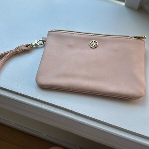 Adrienne Vitadini wristlet purse with an interior charger